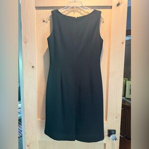 Garfield & Marks Elegant Black Sleeveless Sheath Midi Dress